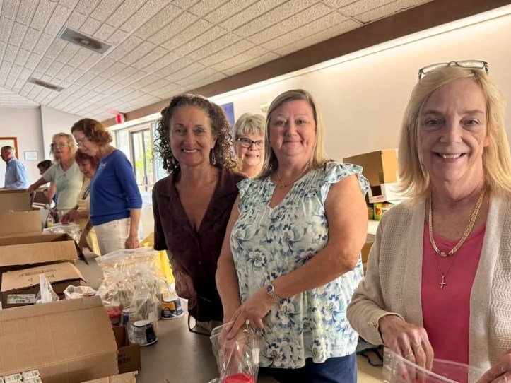 Children’s Hunger Project Lunch Packing Event at Riverside